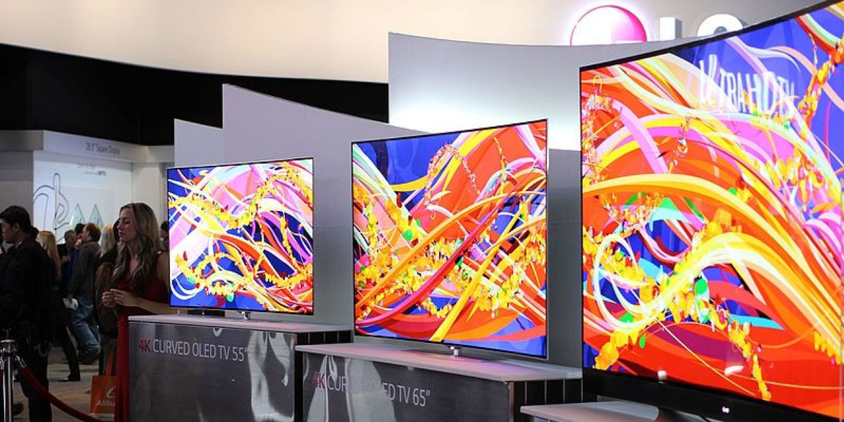 Three LG OLED TVs in display