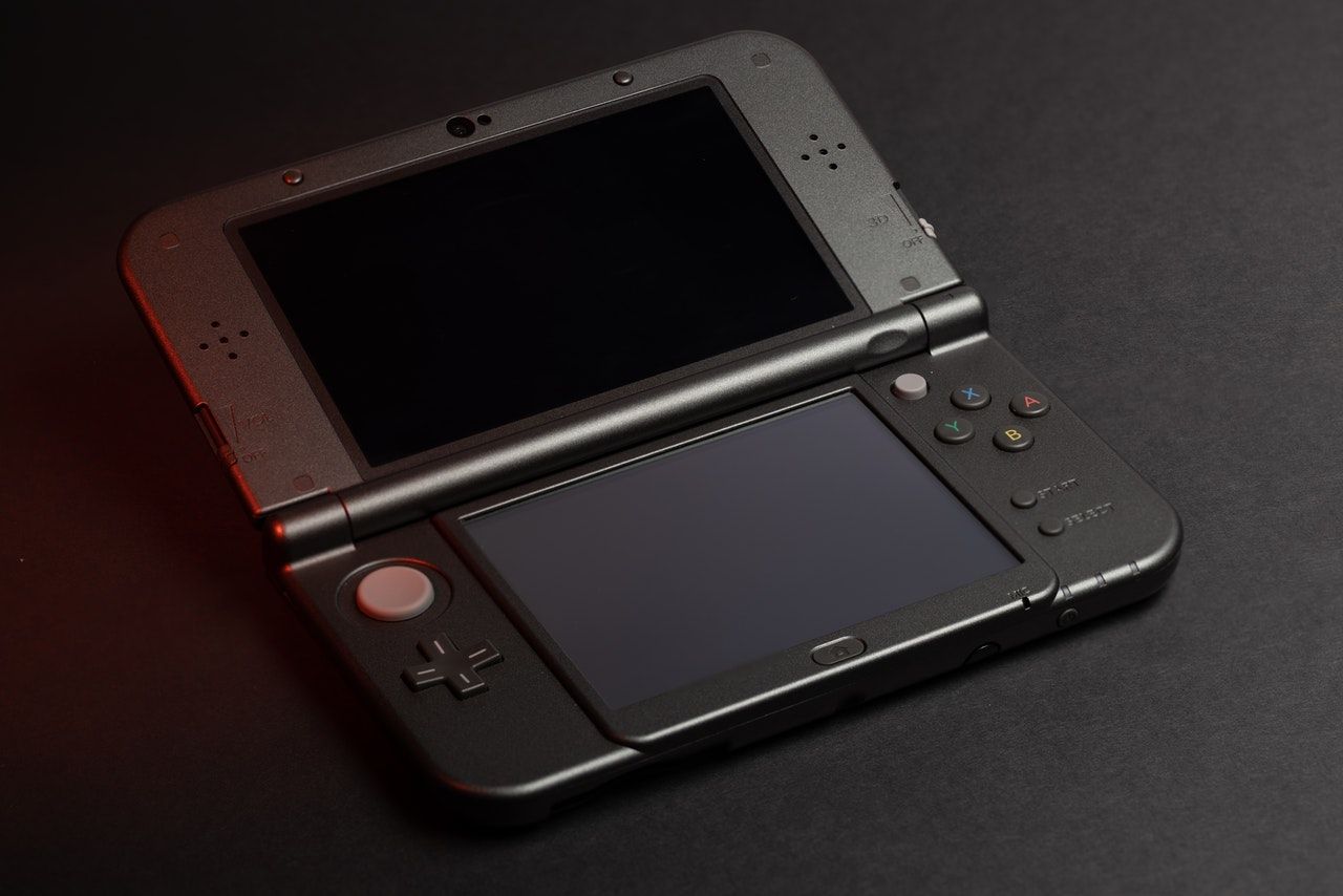 Dark Grey New Nintendo 3DS XL on dark background