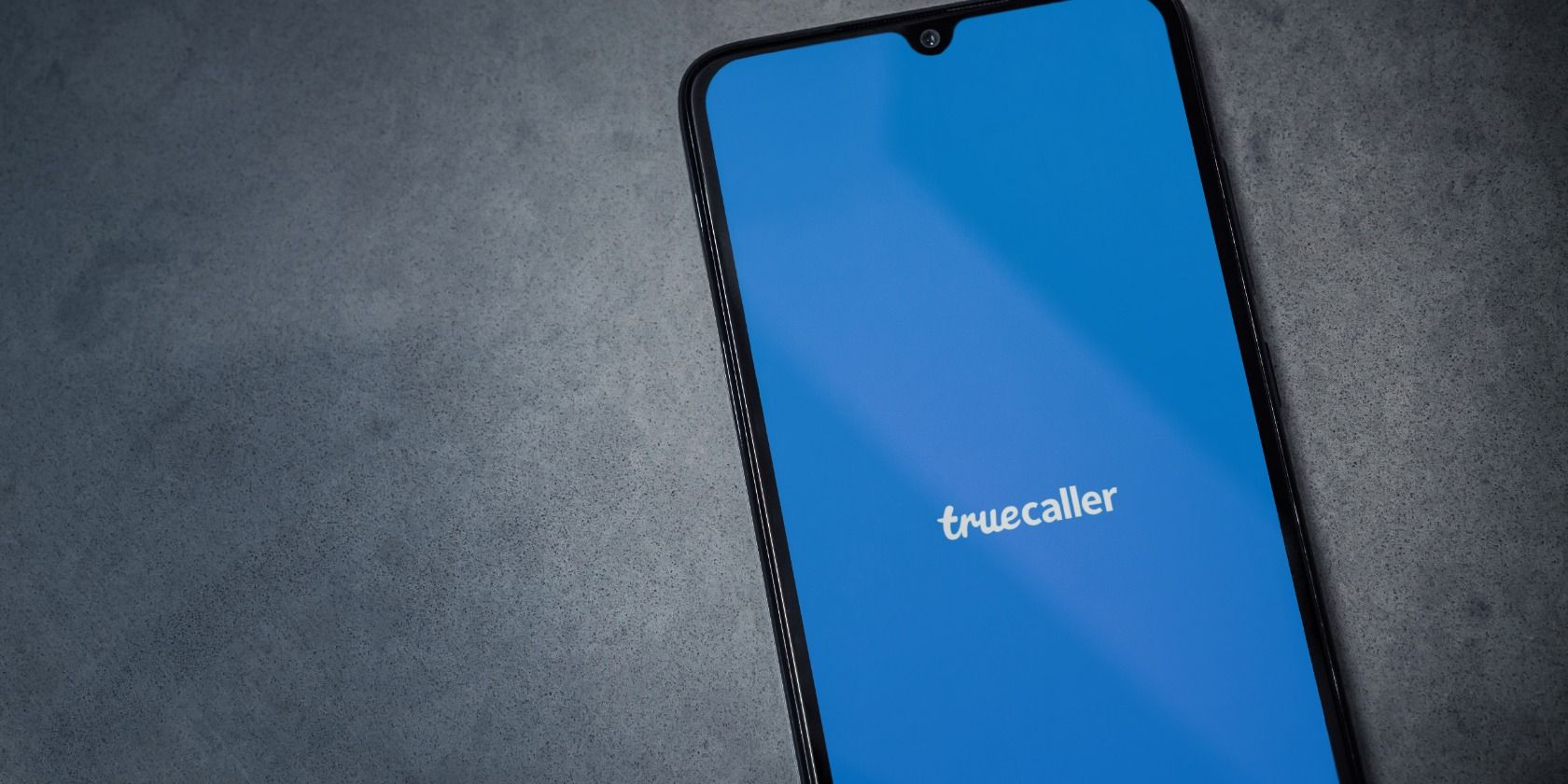 The Launch Screen Of Truecaller App Featuring Its Logo Displayed On A Black  Background Photo And Picture For Free Download - Pngtree