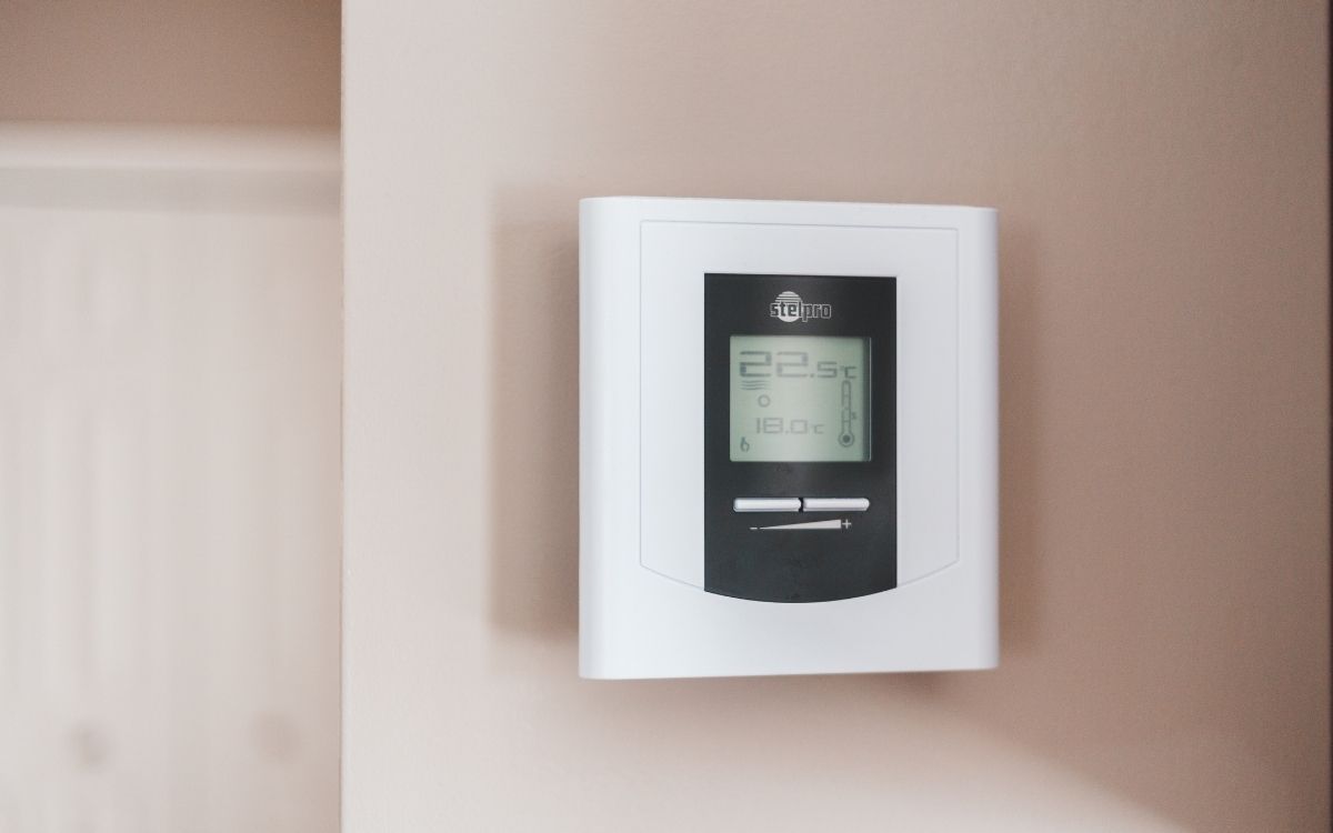 White thermostat on the wall