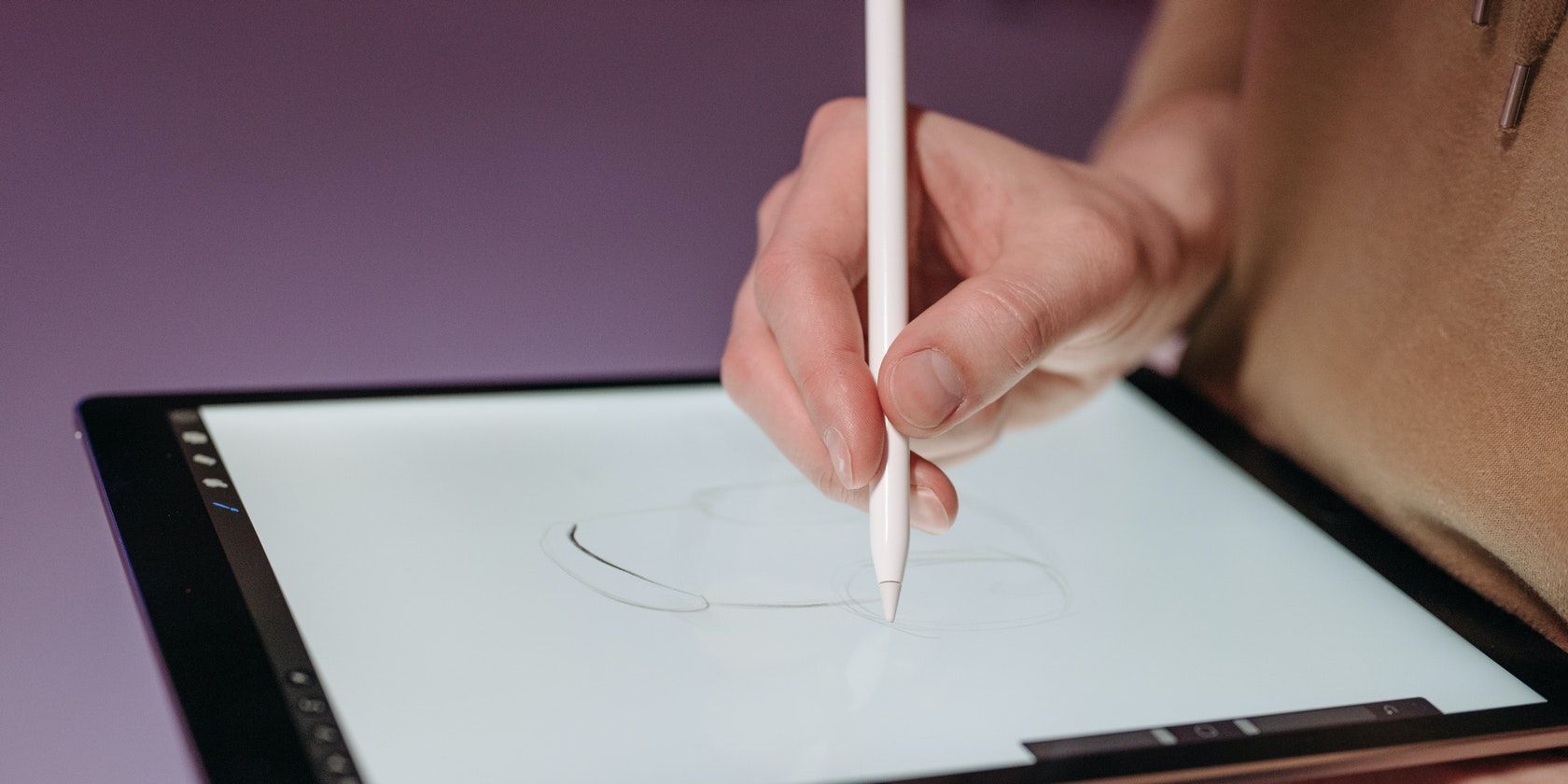 Women Drawing on a Device