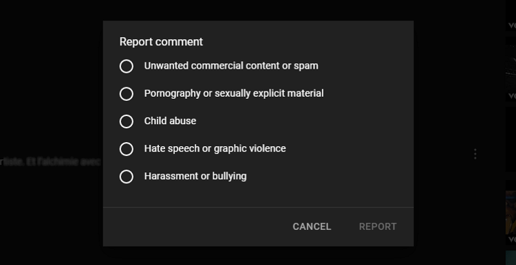 YouTube report a comment click REPORT