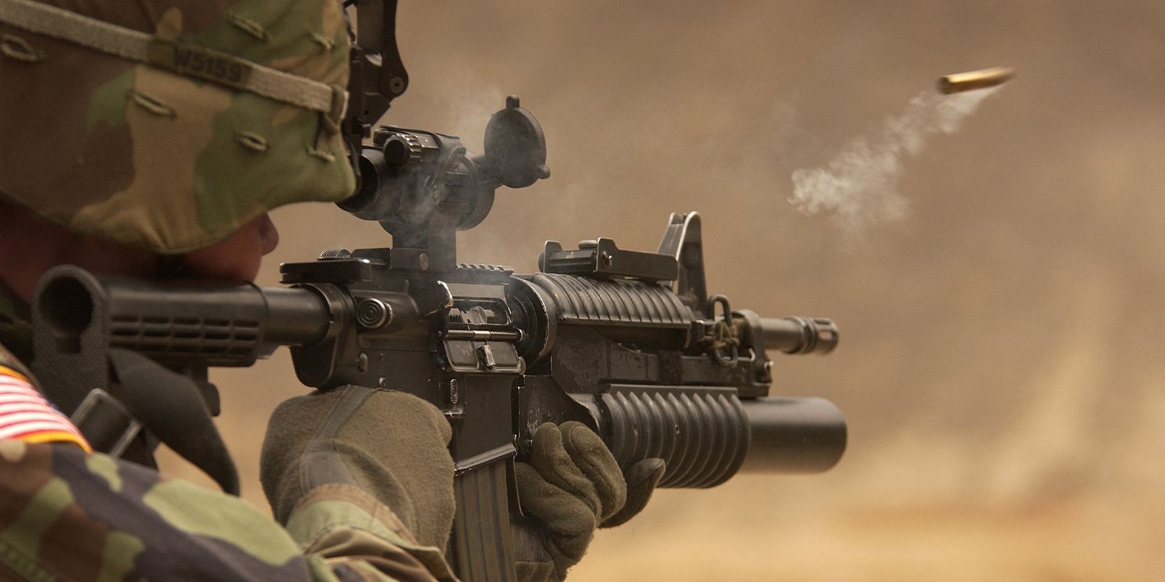 a US soldier firing a weapon