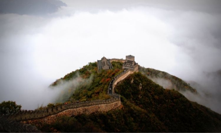 Aerial view of the Great Wall of China with Fog creeping in 