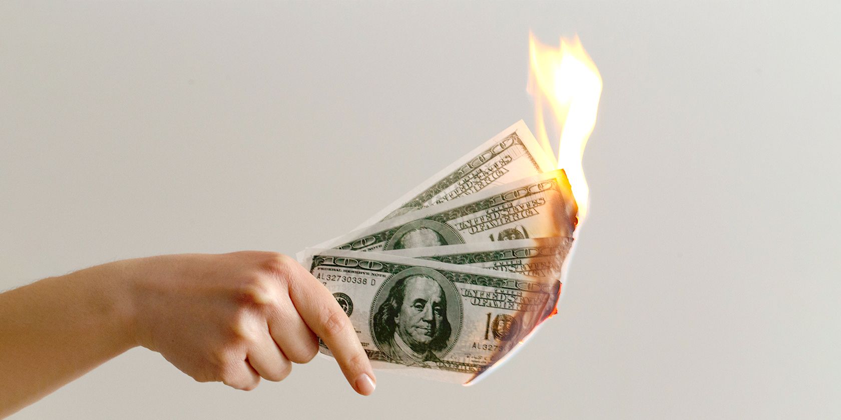 burning hundred dollar bills