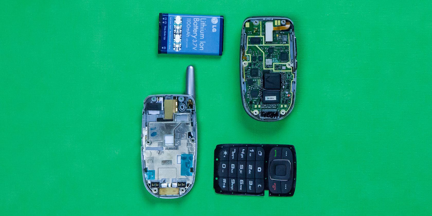 disassembled mobile phone showing its removable battery