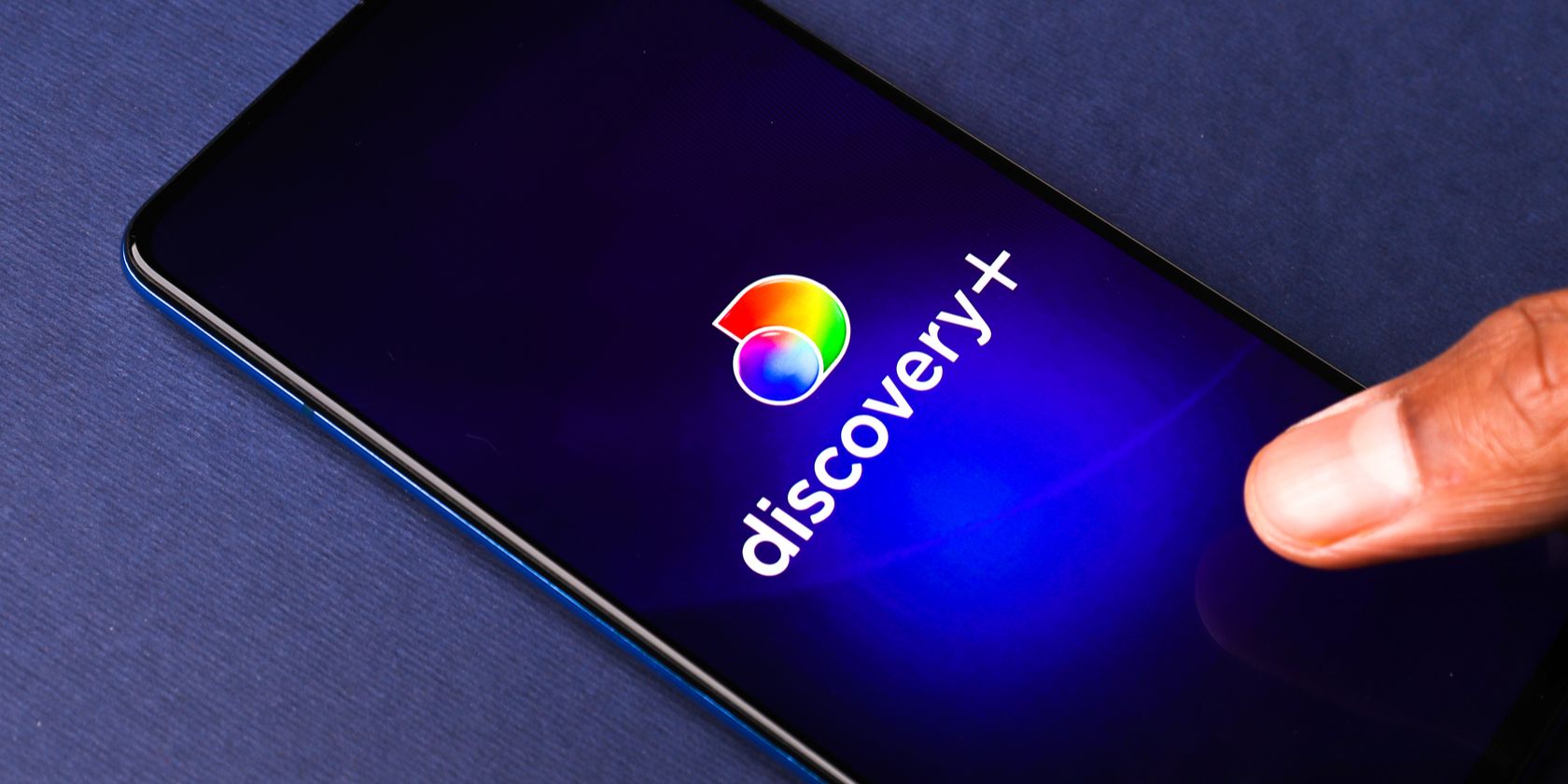 discovery plus logo on phone