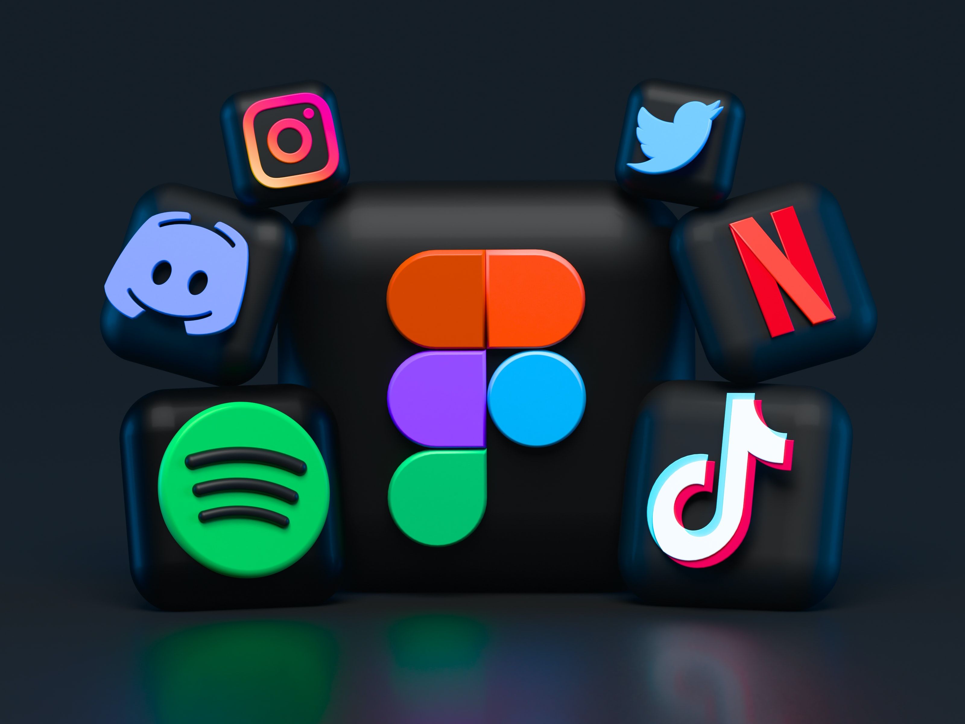 A bunch of social media icons over black.