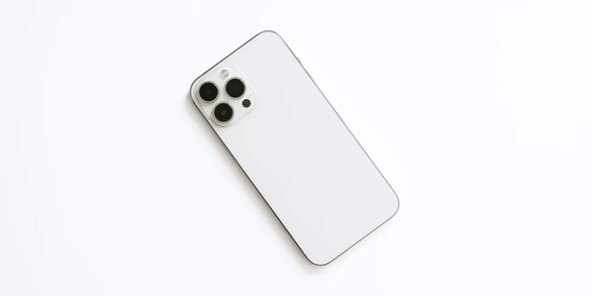 iphone 13 pro silver on white surface