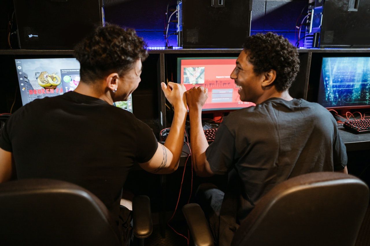 Two men playing computer games