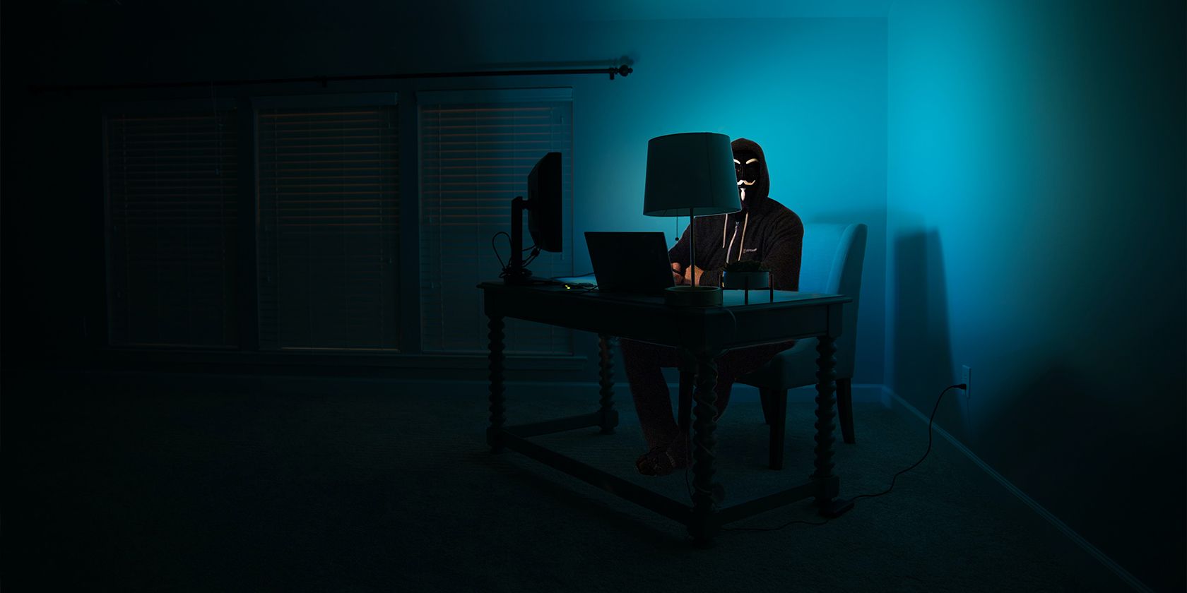 online predator sitting in front of a computer