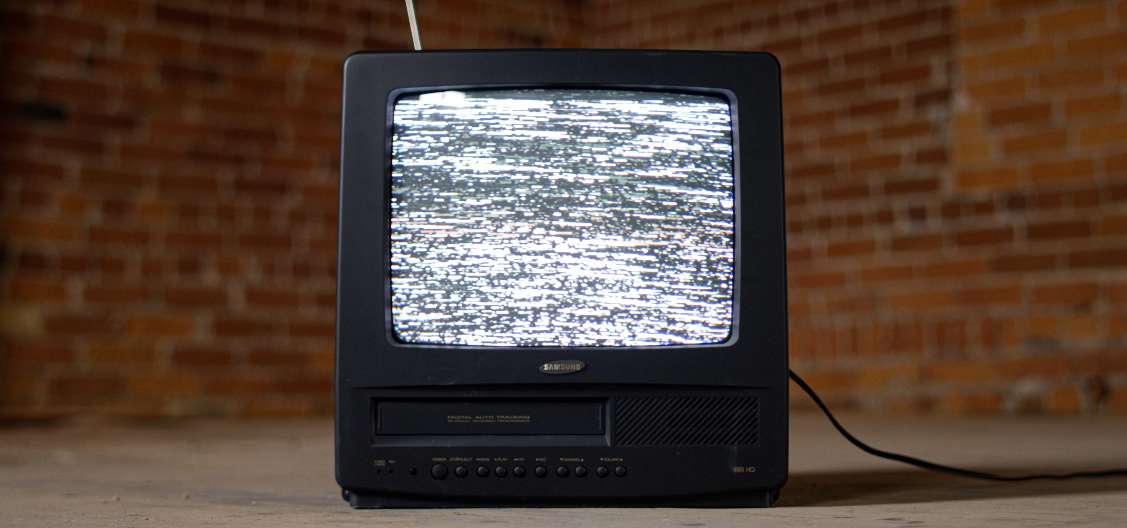 A television with static on the screen.