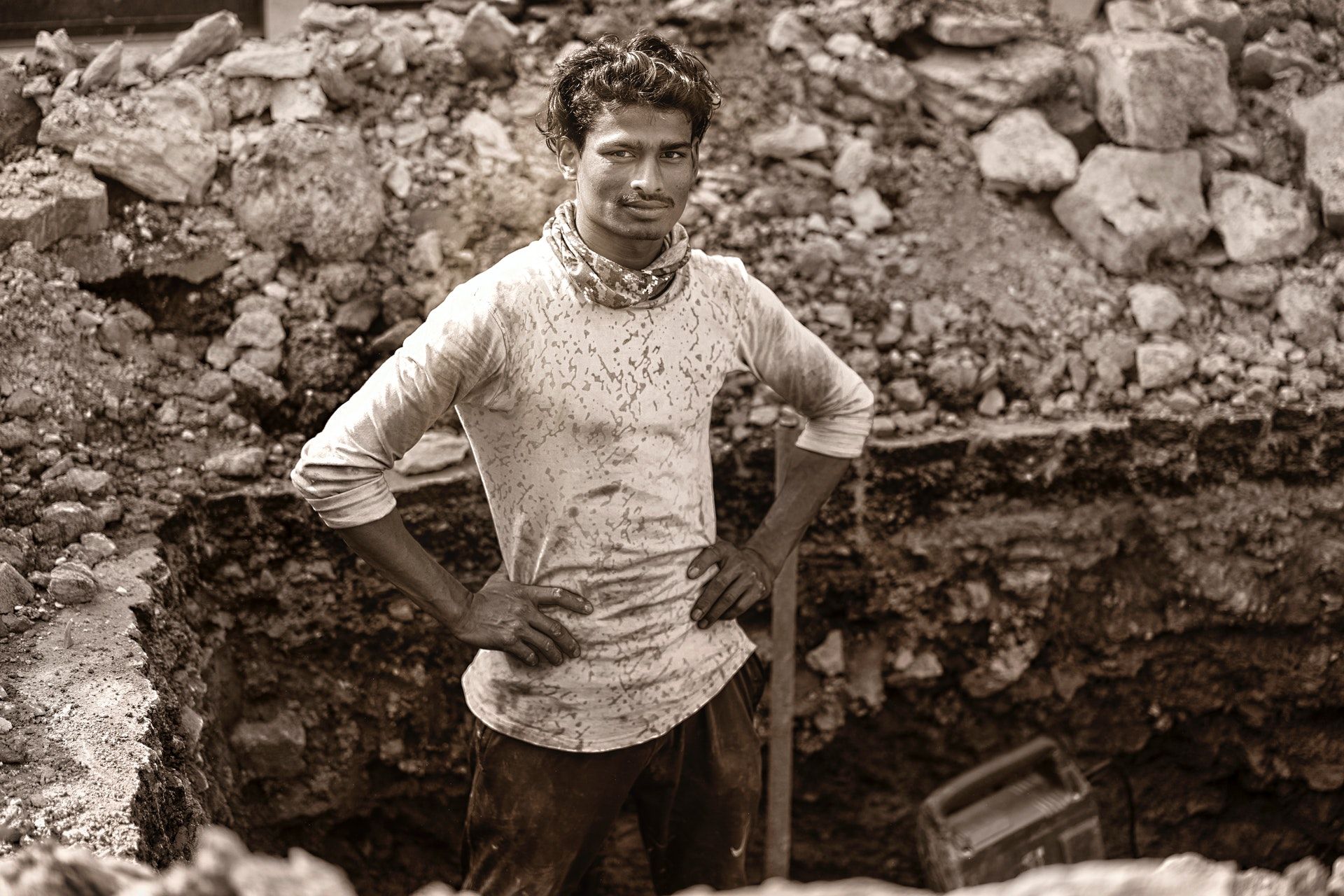 A laborer posing for a picture