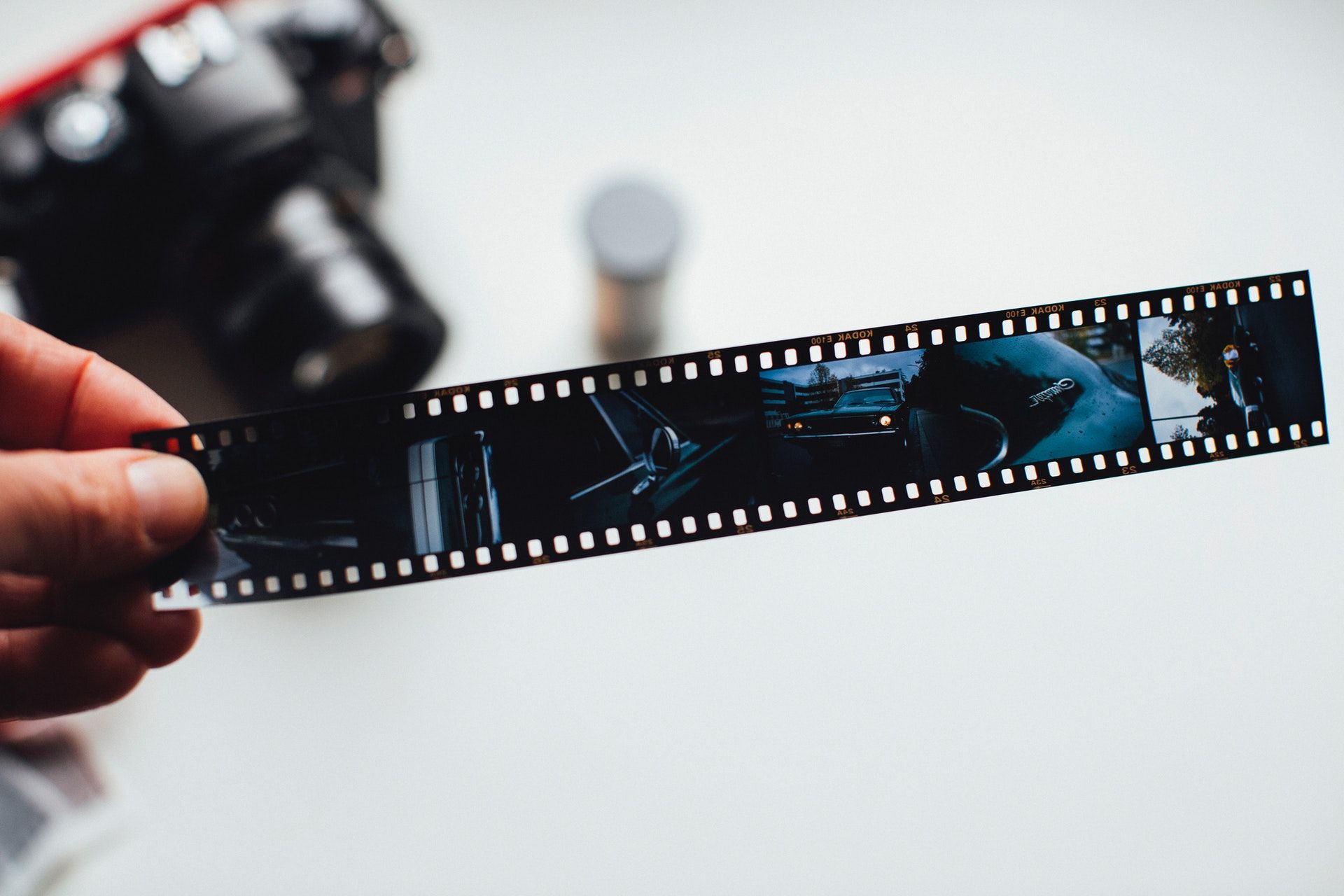 A strip of camera film showing images