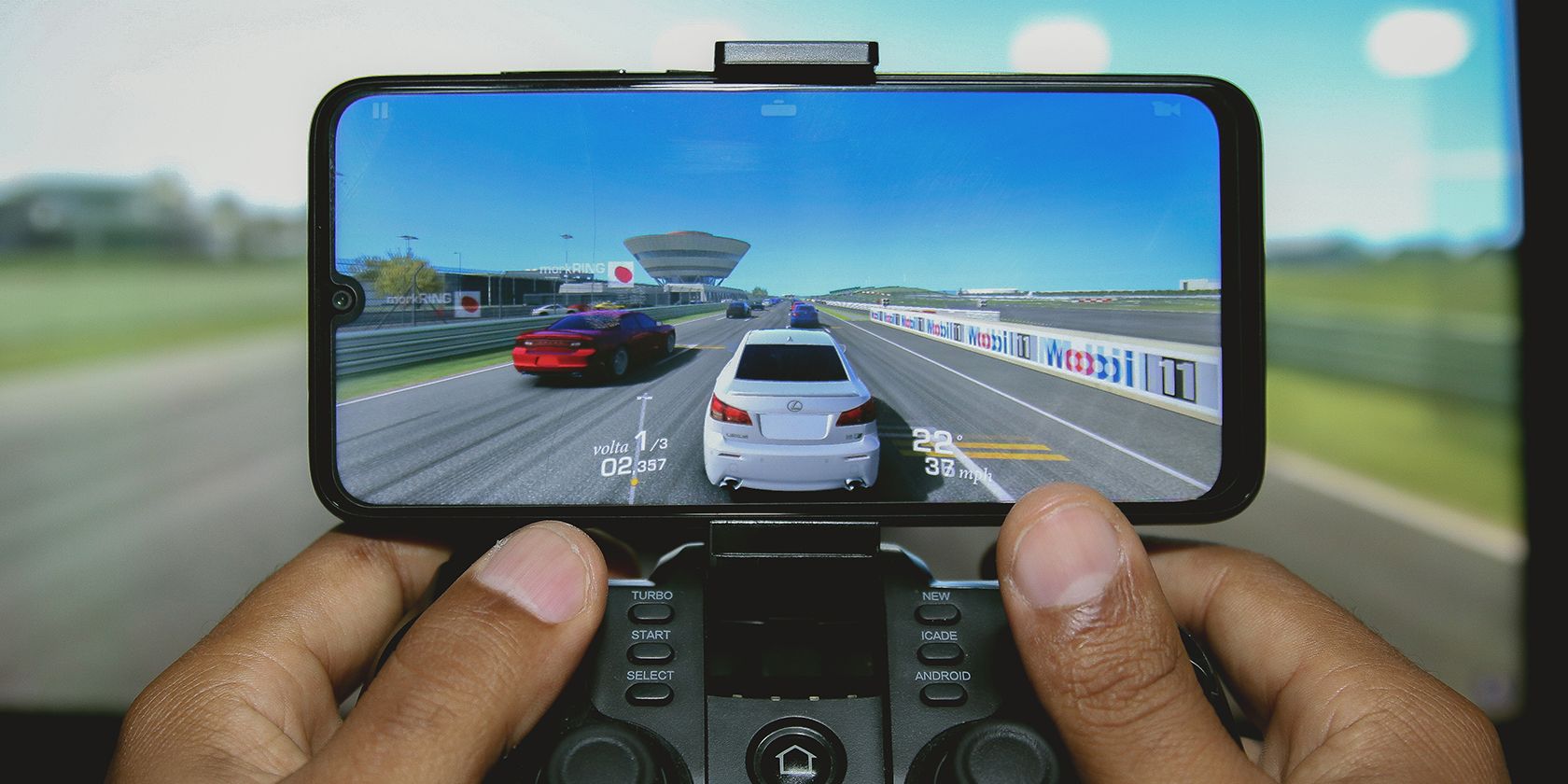 playing Real Racing 3 on an android smartphone