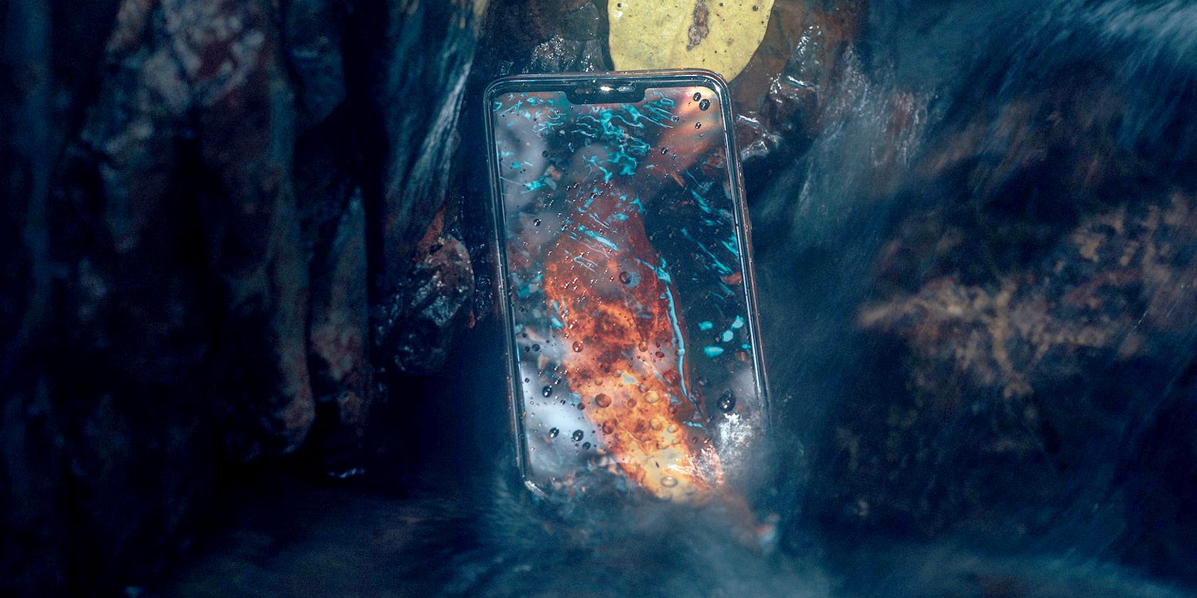 smartphone in flowing water protected by its IP rating