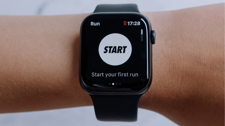 A black smartwatch with a workout app open