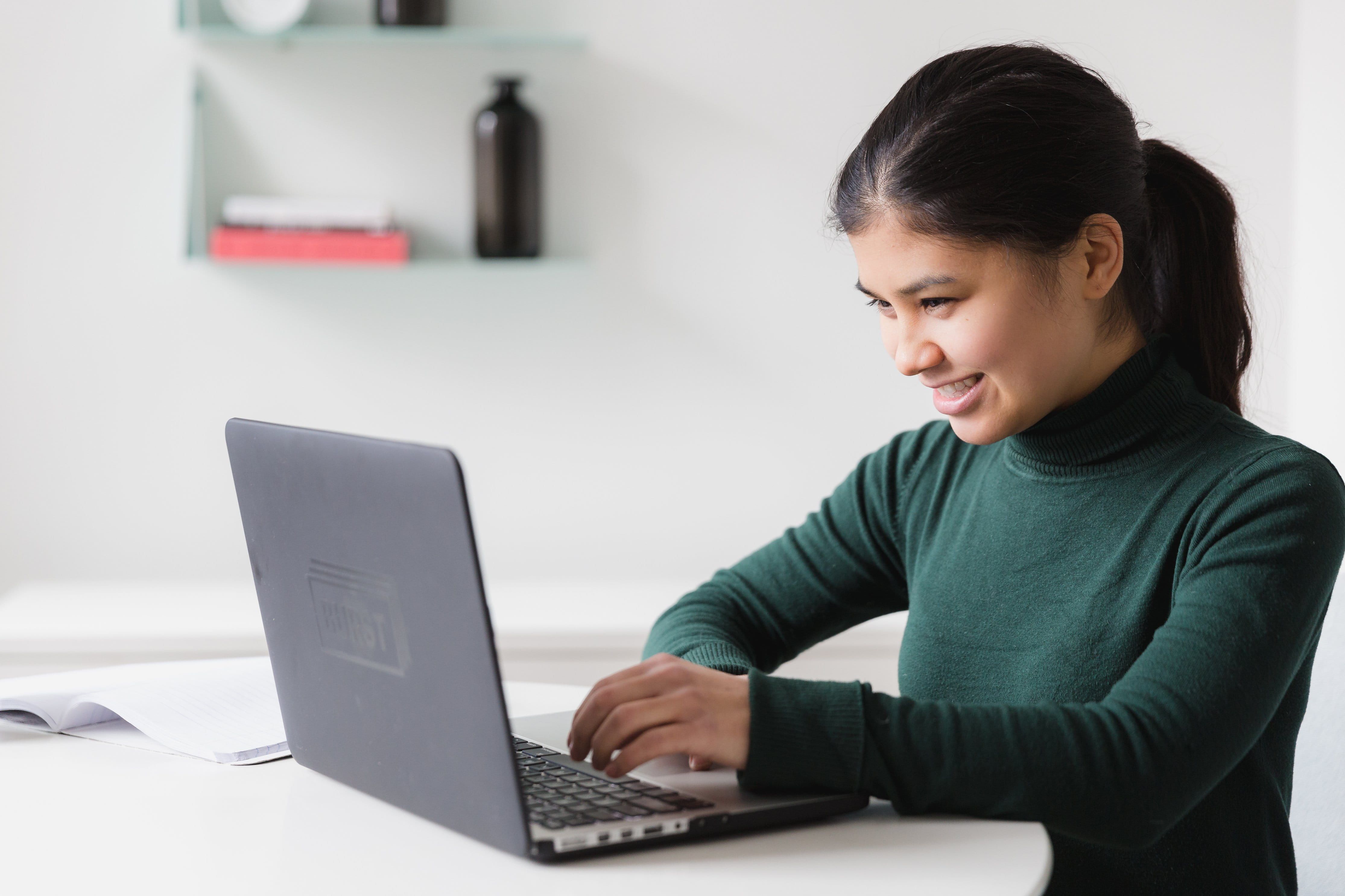 woman confident on computer