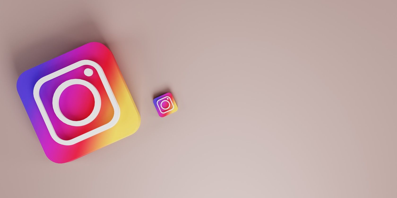 one large and one tiny 3D Instagram logos