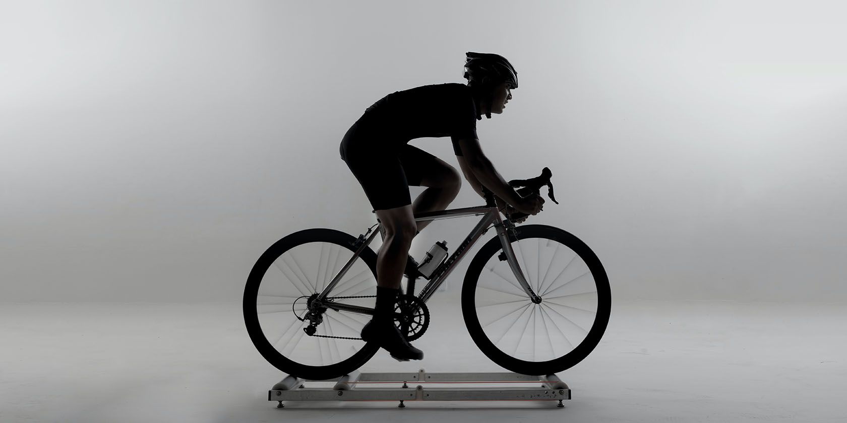 Cyclist on indoor roller trainer