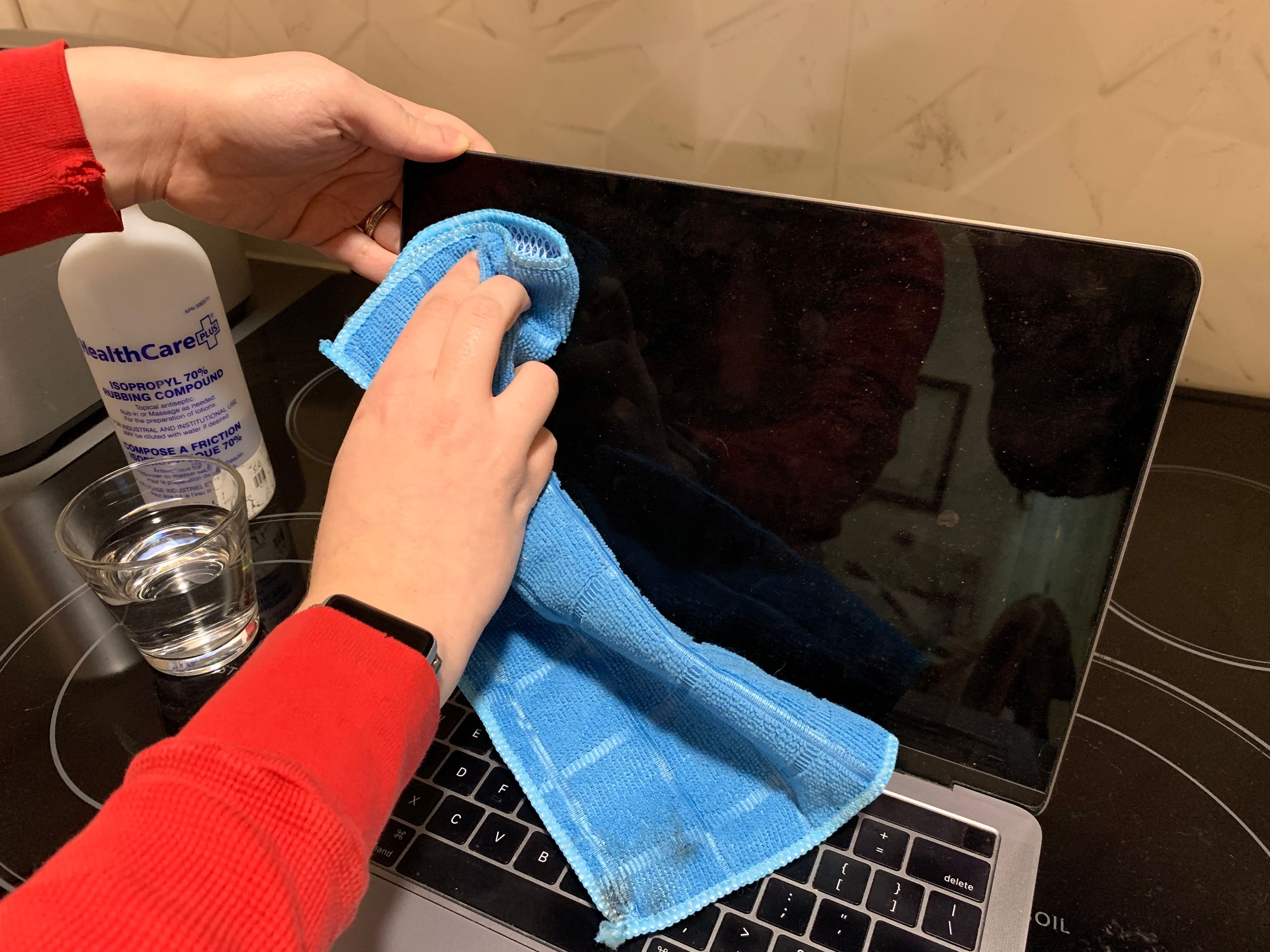 how to clean a macbook pro screen spit and water