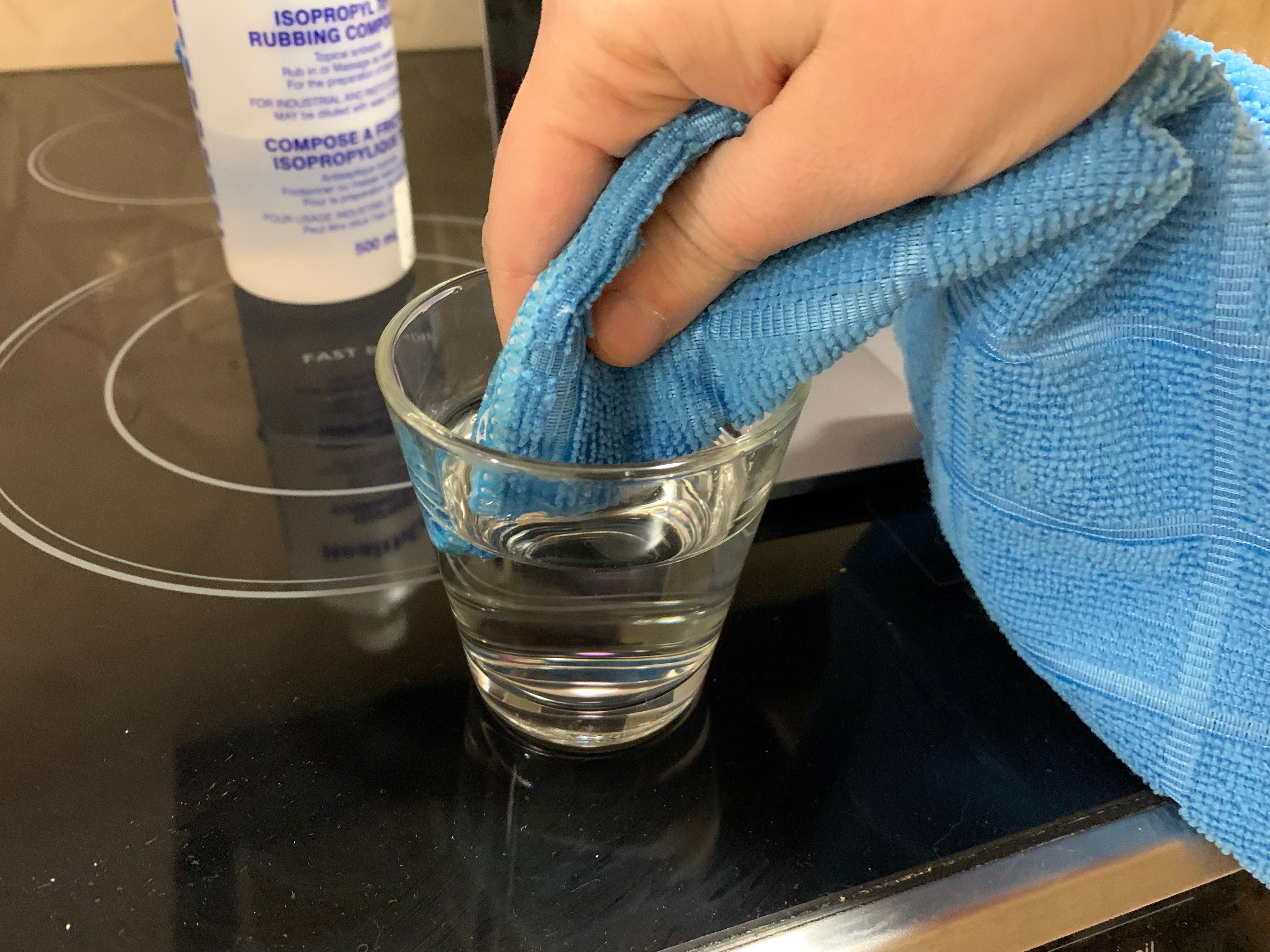how to clean a macbook pro screen spit and water