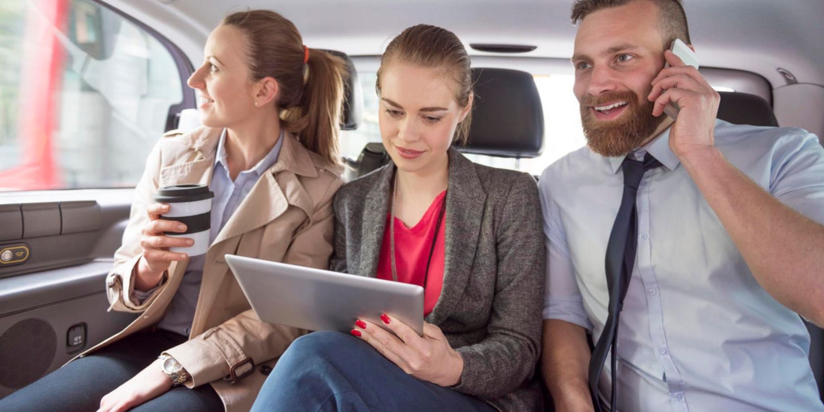 Car passengers using Wi-Fi internet for voice calls and surfing