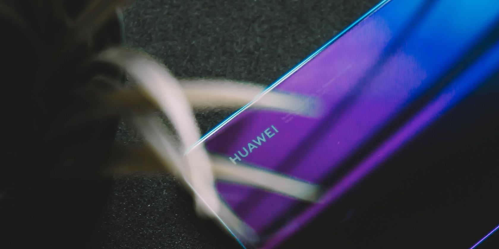 Huawei phone on a dark background