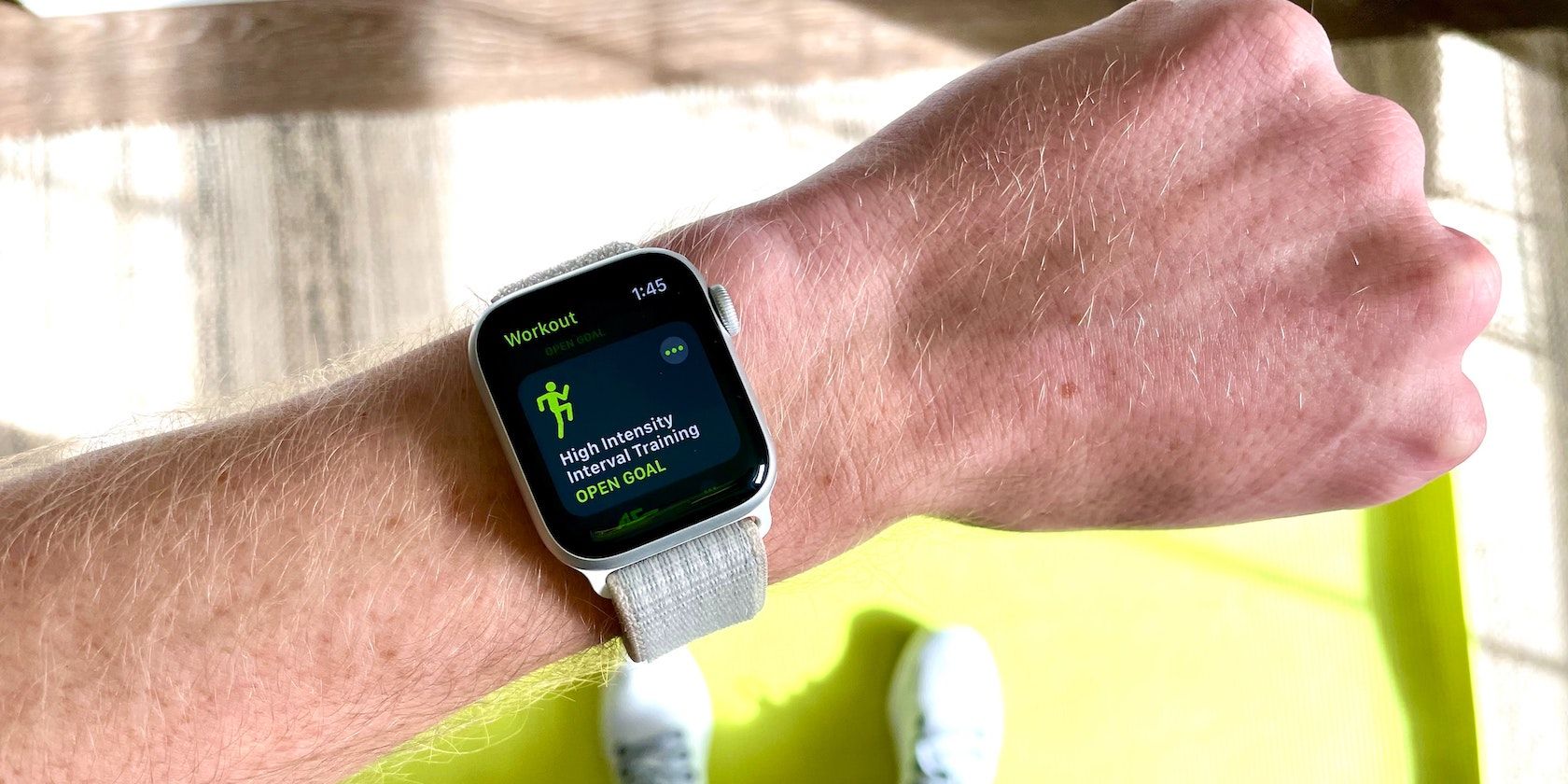 Person Holding Apple Watch Featured Image