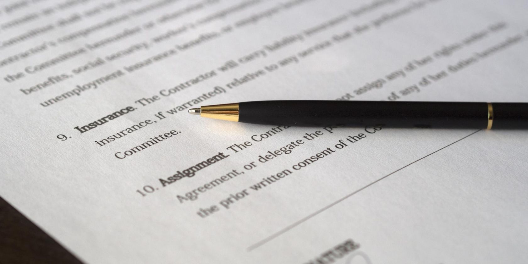 A pen on a contract paper