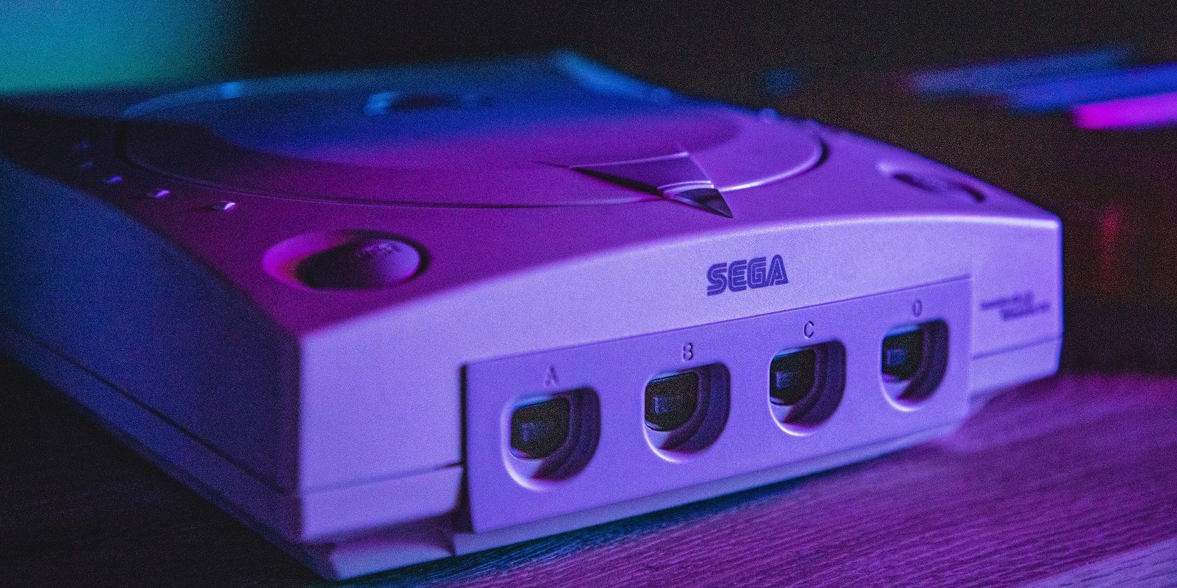Sega console in a blue light background