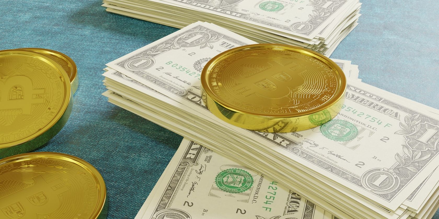 bitcoin on stacks of dollars