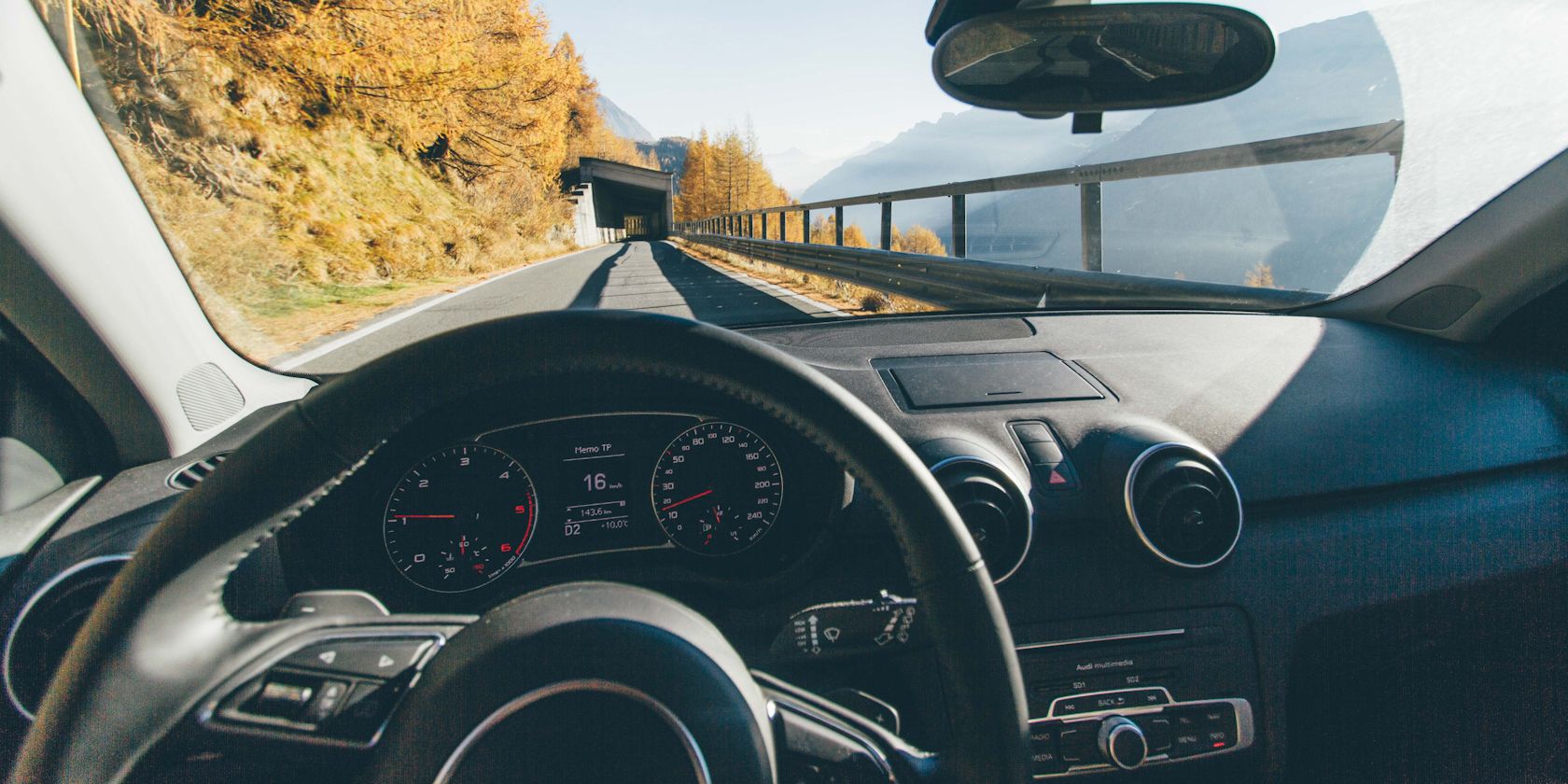 Car interior equipped with cruise control.