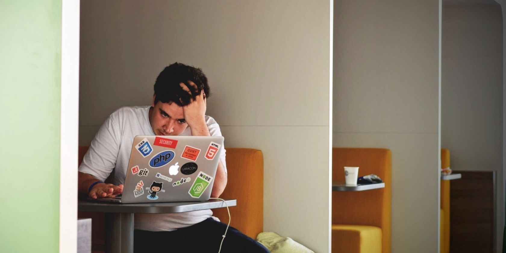 frustrated guy looking at laptop