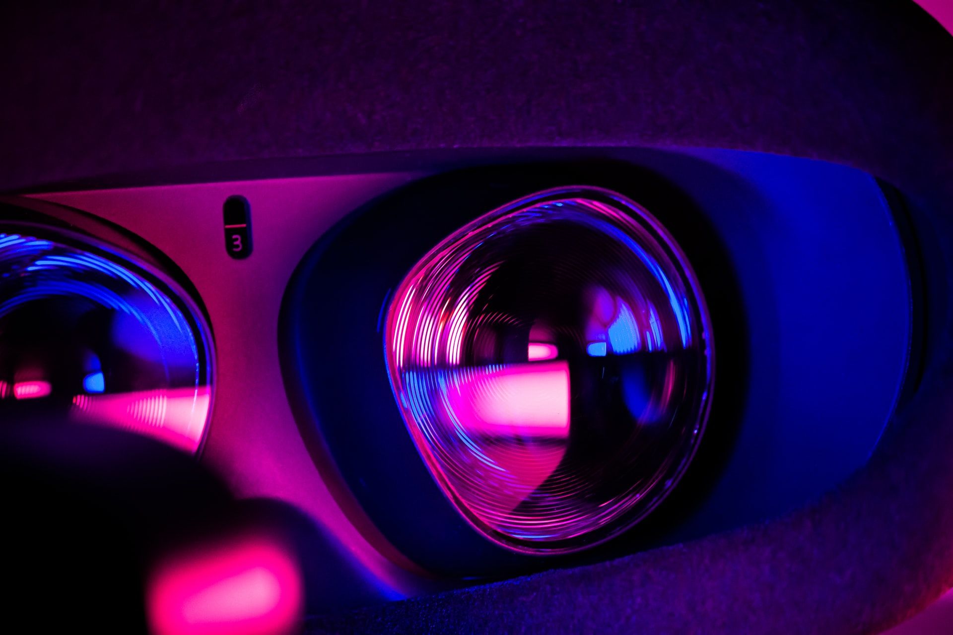 inside of a vr headset with pink and purple led lights