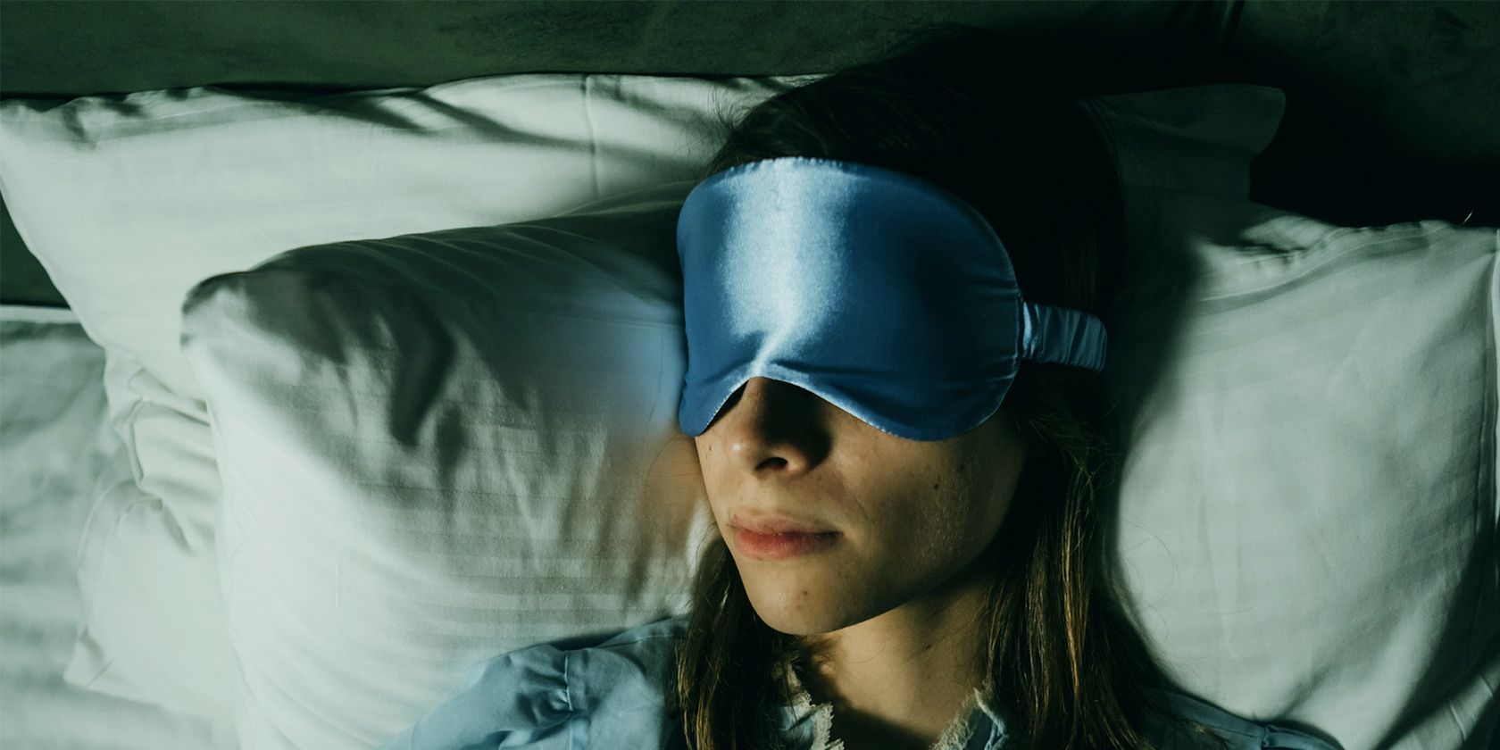 a person using a sleeping mask