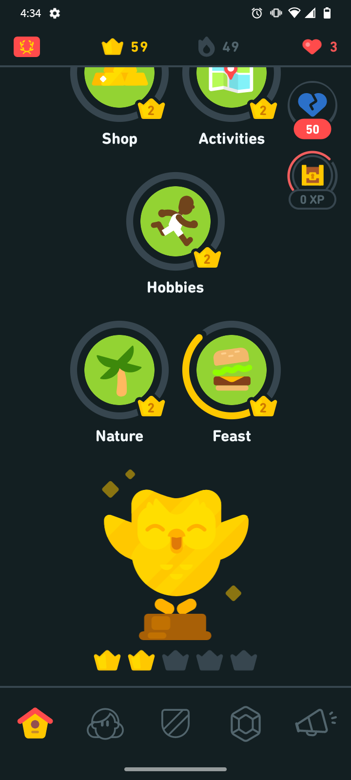 The bottom of a Duolingo language skill tree, featuring the Golden Owl and two completed crown levels.