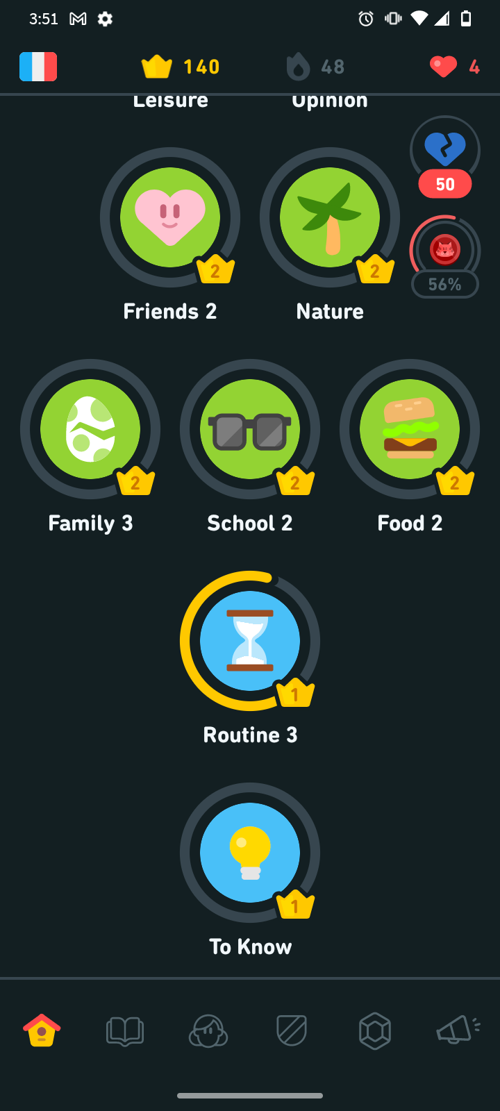 A Duolingo language skill tree showing skills in progress and various crown levels.