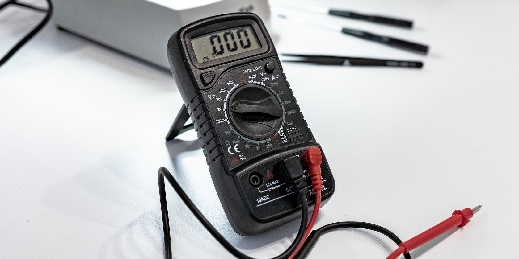A multimeter with probes connected