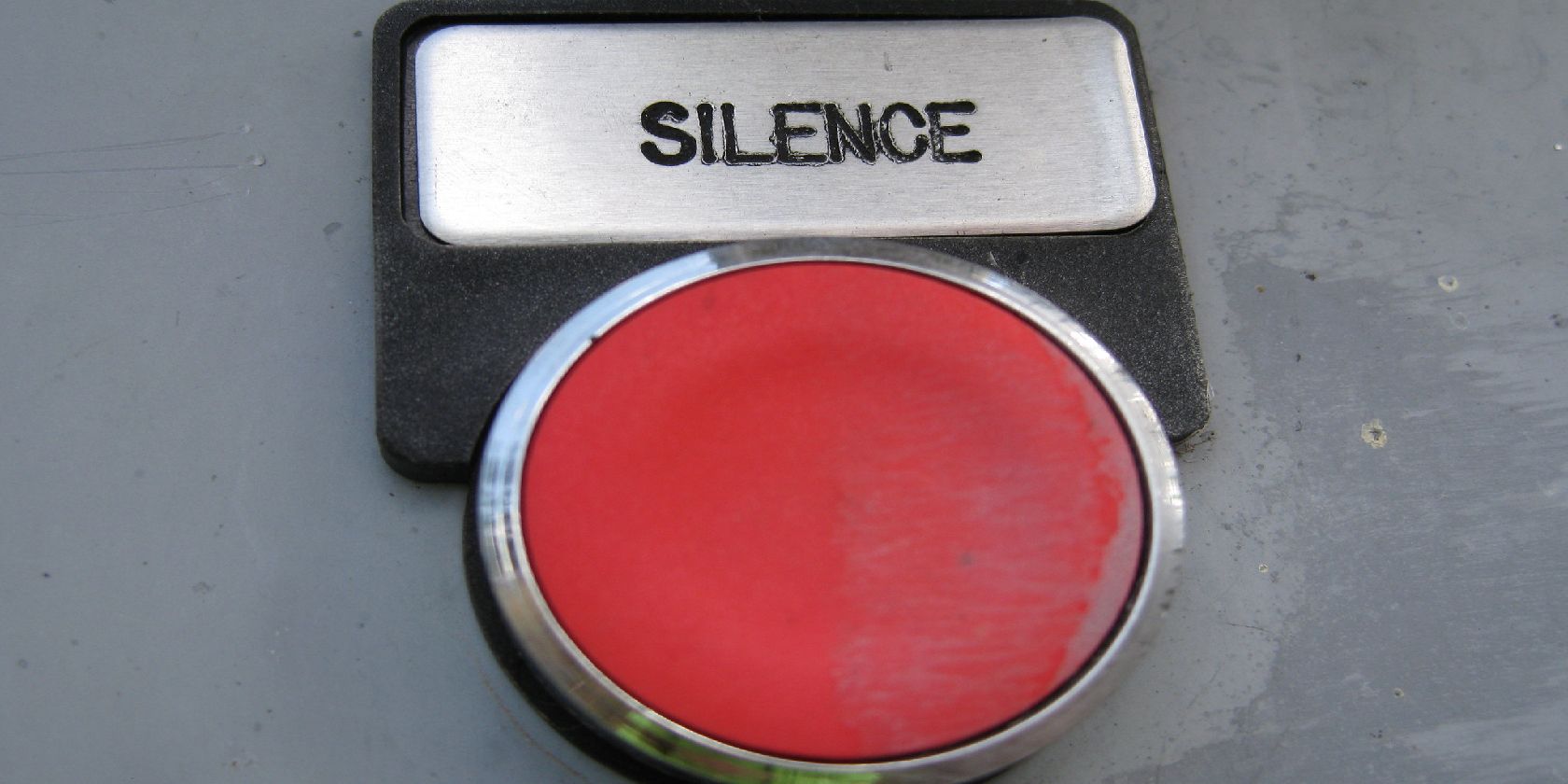 Red button labeled 