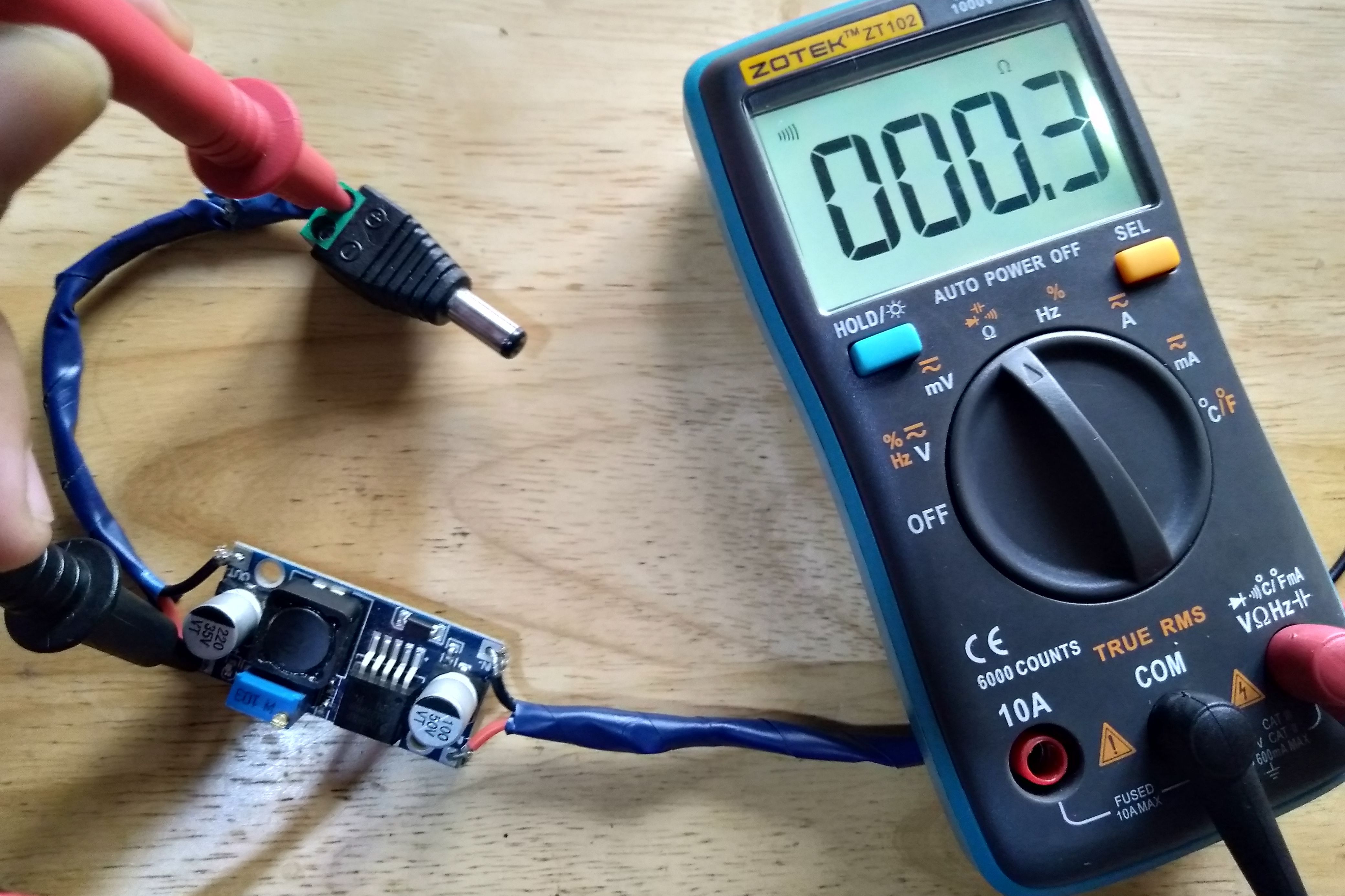 A multimeter testing continuity
