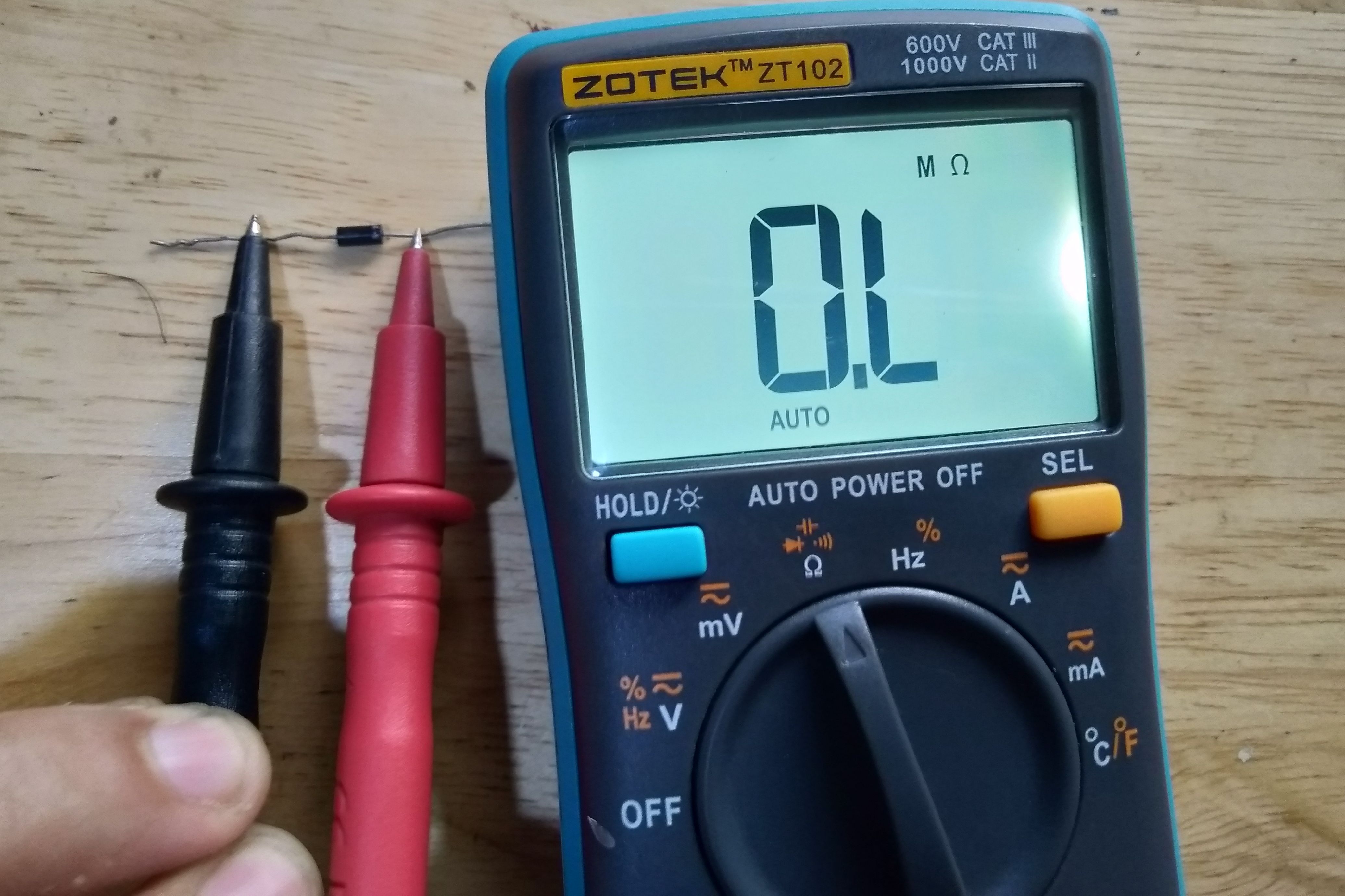 Using a multimeter to test resistance for a diode