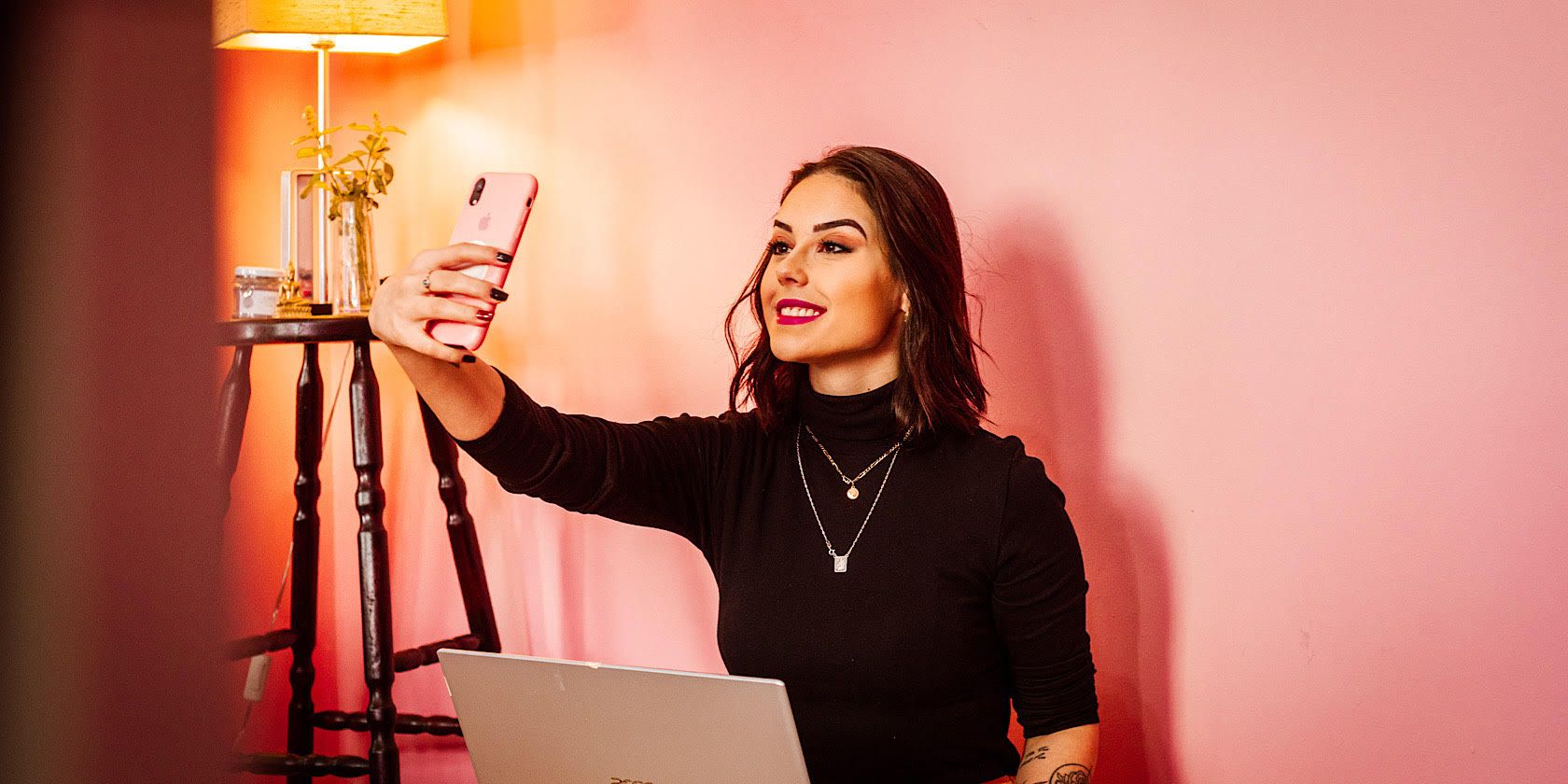 Woman Taking a Selfie in Room