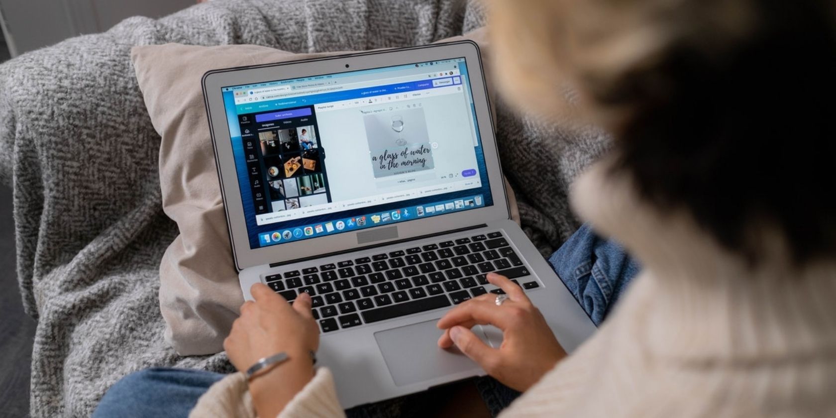 woman using canva on laptop