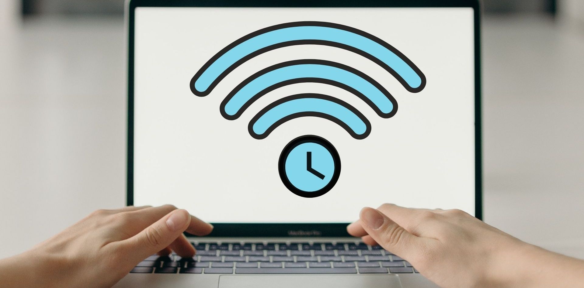 wifi and clock logo on laptop screen