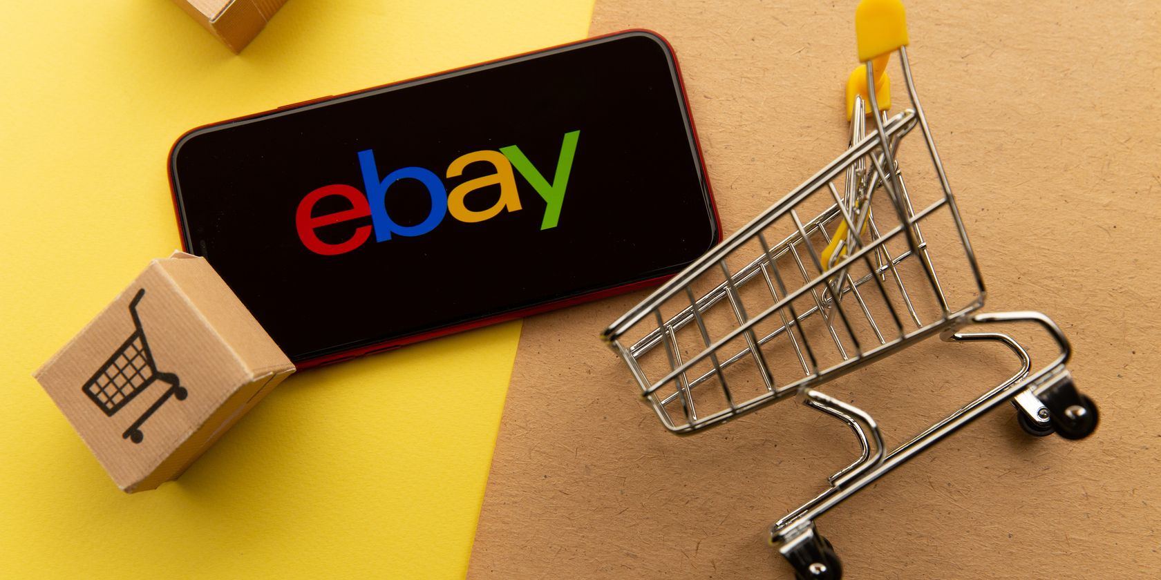 ebay-логотип-на-телефоне рядом с корзиной