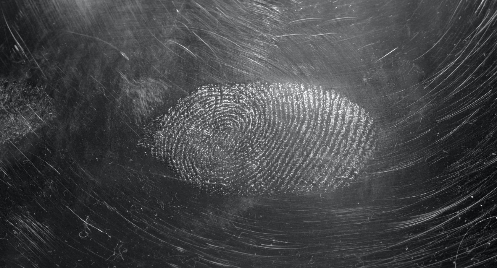 Fingerprint smudge on glass lens