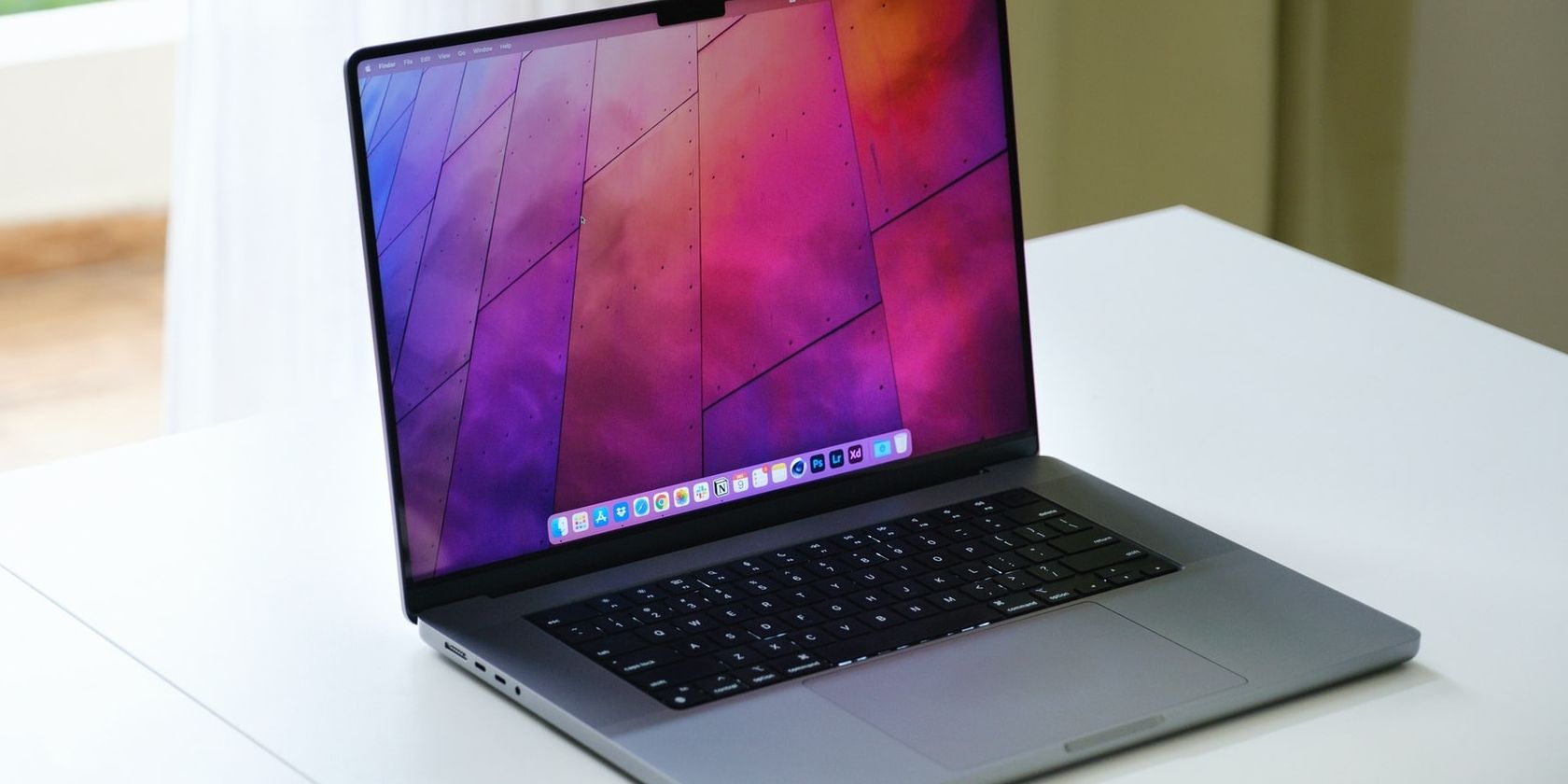 Open MacBook sitting on desk