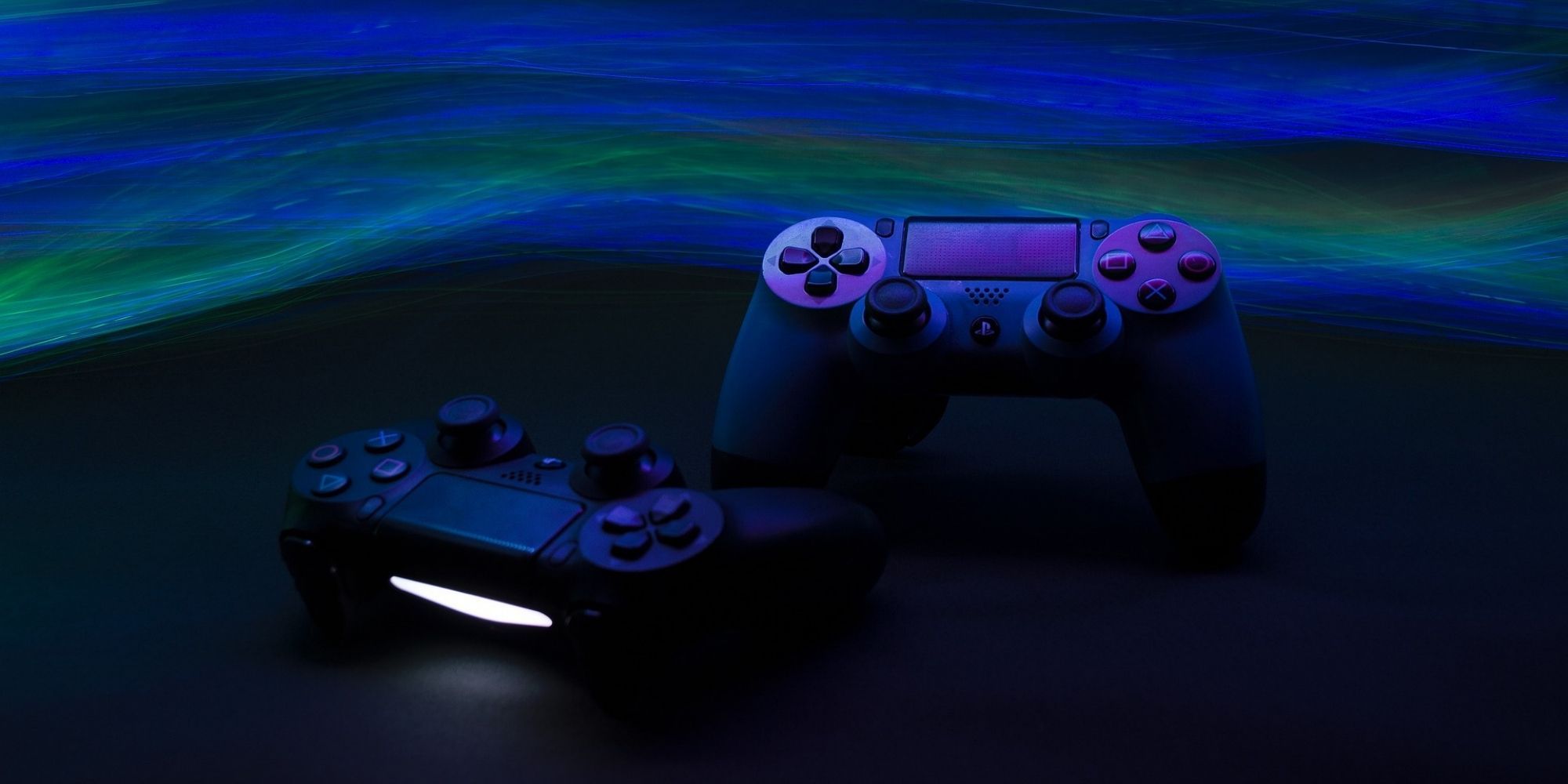 An image of two PS4 controllers.