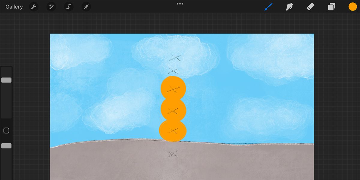 Procreate screen showing a landscape with 3 orange balls above one another.